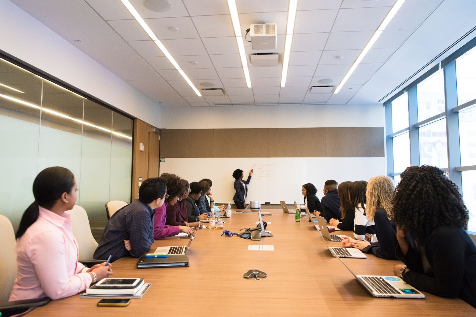 A professional team in a boardroom during a working meeting.